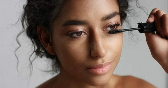 storyblocks adorable teenage middle eastern girl with great skin applying mascara to her long lashes on white background Biq E9PhW e1582739266635